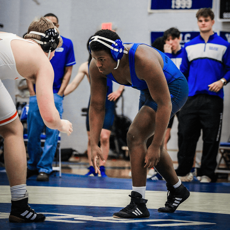 Blue Ridge School wrestler crouches in the beginning of a match